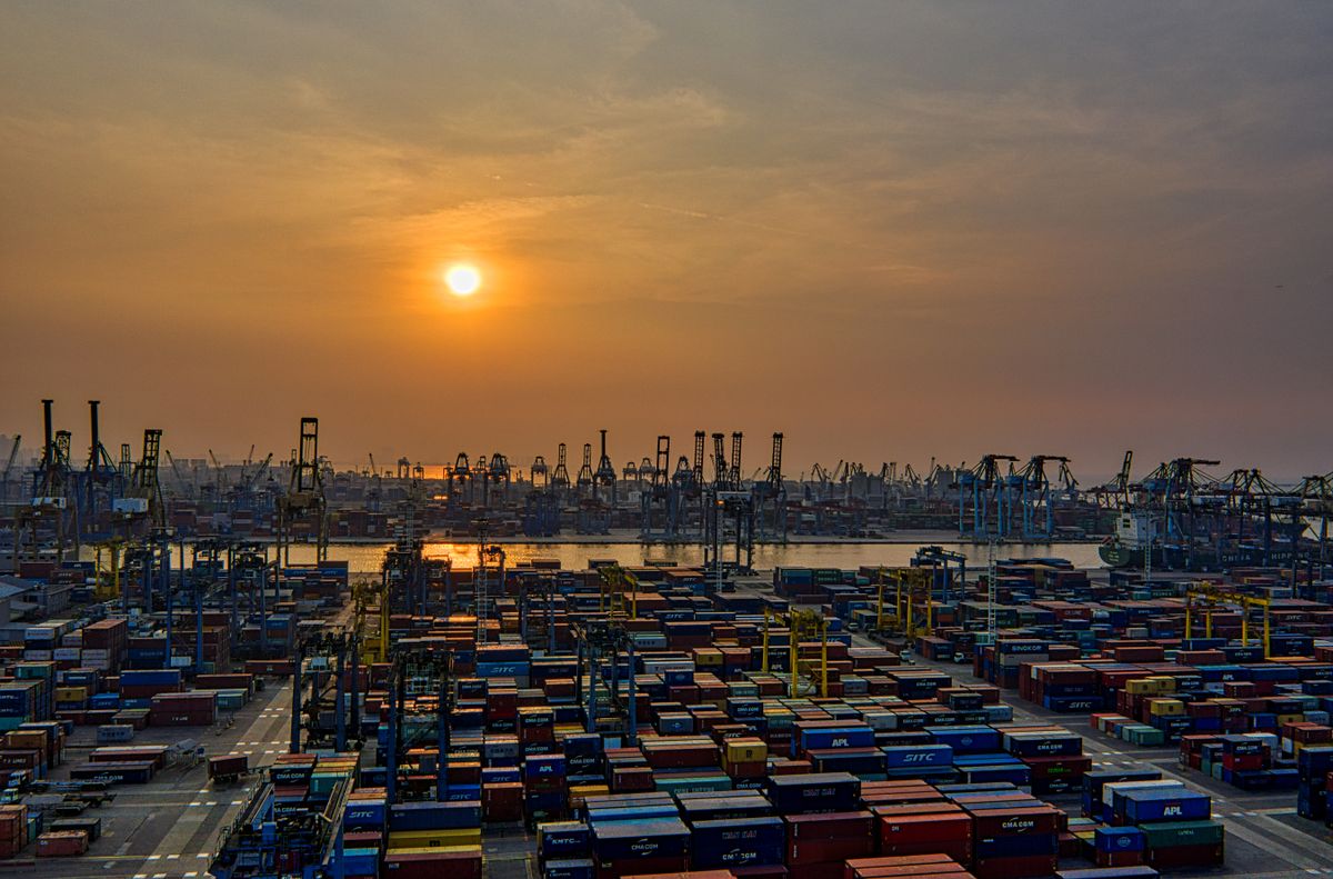 Liner agency team managing shipping operations at a port office